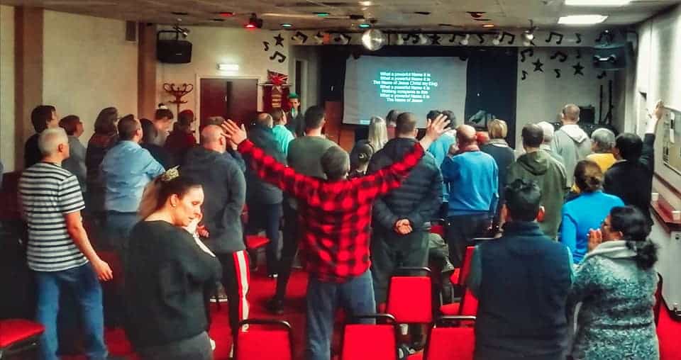 Group of people worshipping