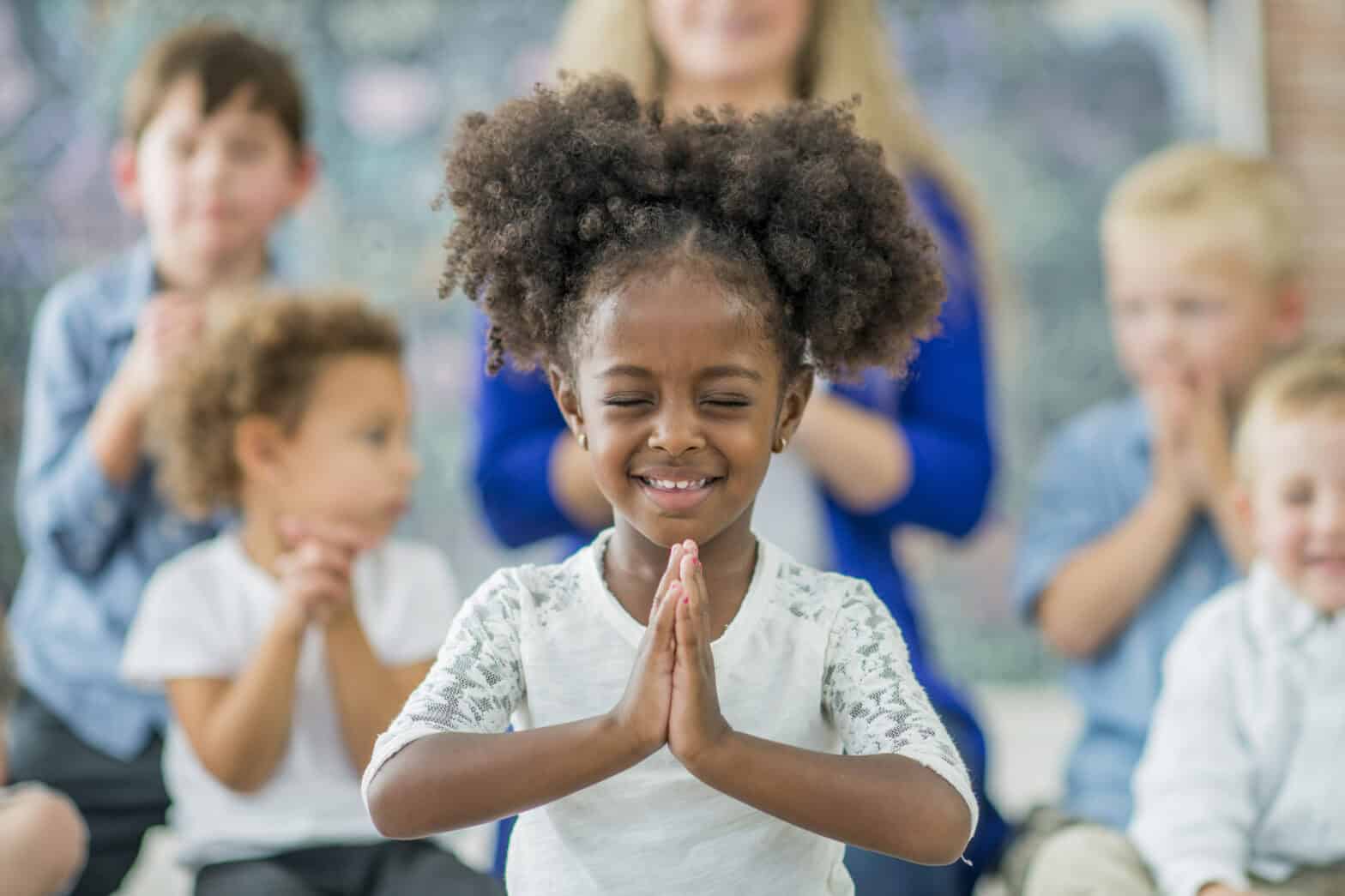 Young children praying
