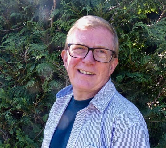 Pete English smiles into the camera