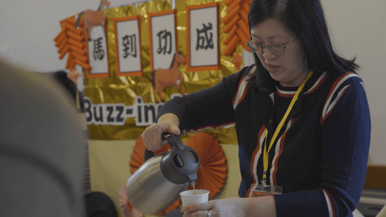 A lady in Trinity Church Earley serving tea
